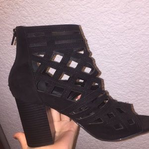 Black cage heels.